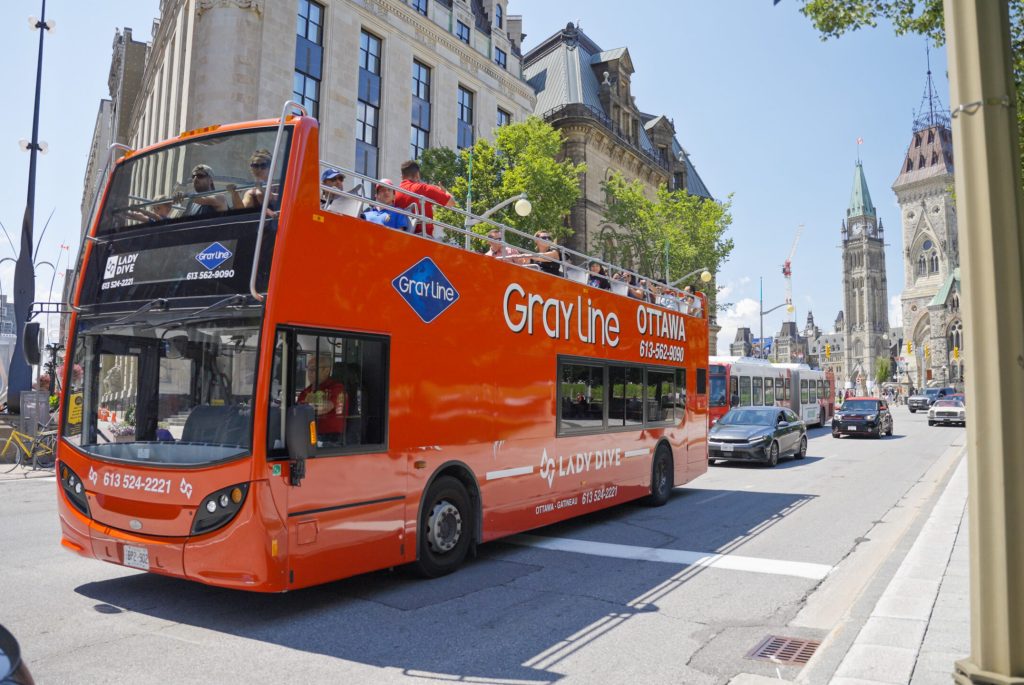 Golden Ticket discount program customers on a Gray Line bus tour in Ottawa
